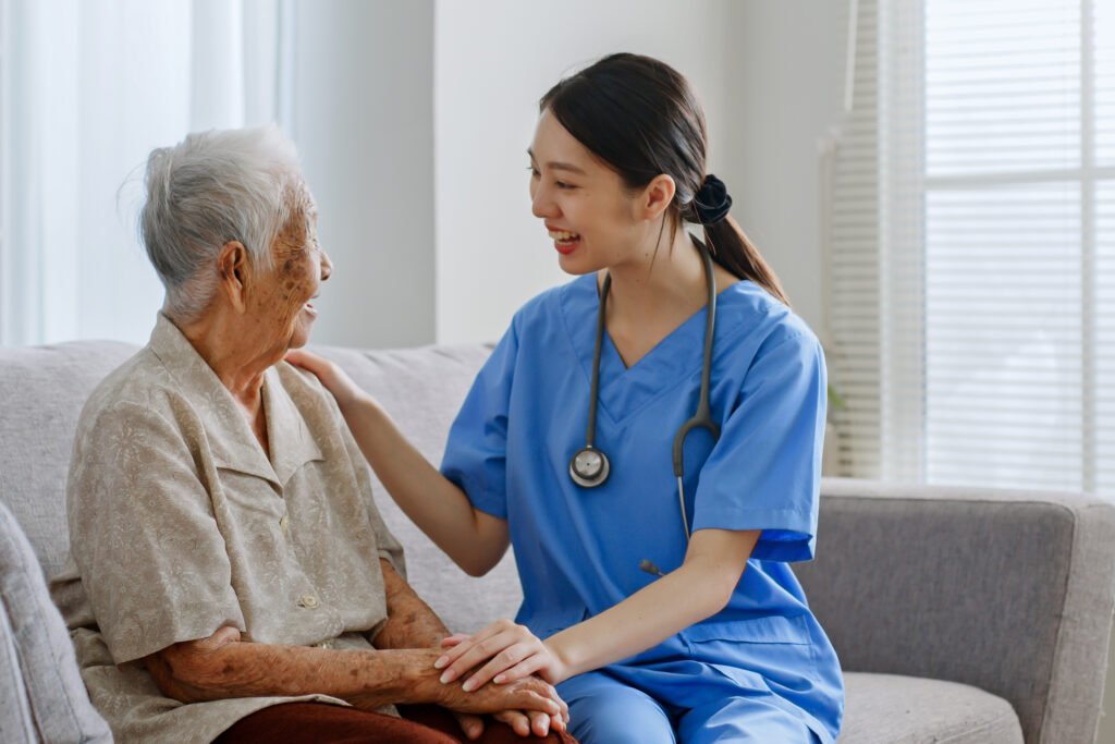 senior receiving companion care from an in-home health aide