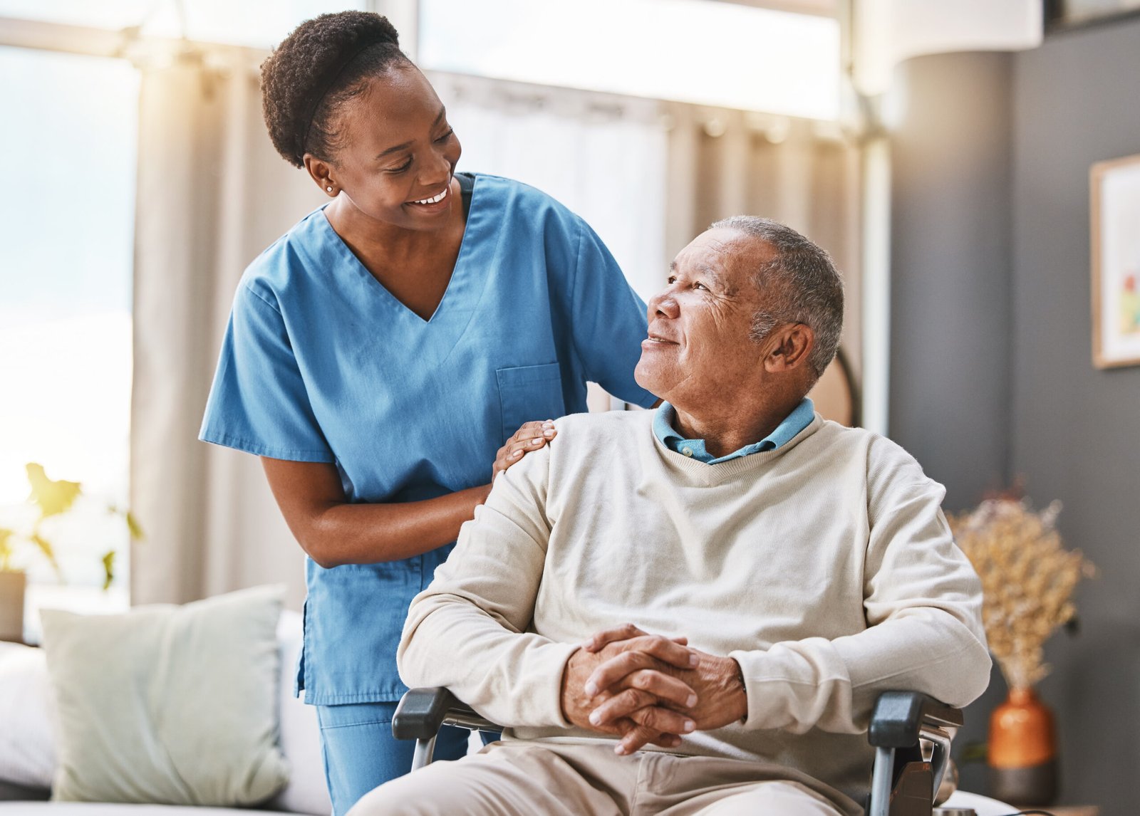 elderly man in wheelchair receiving home care